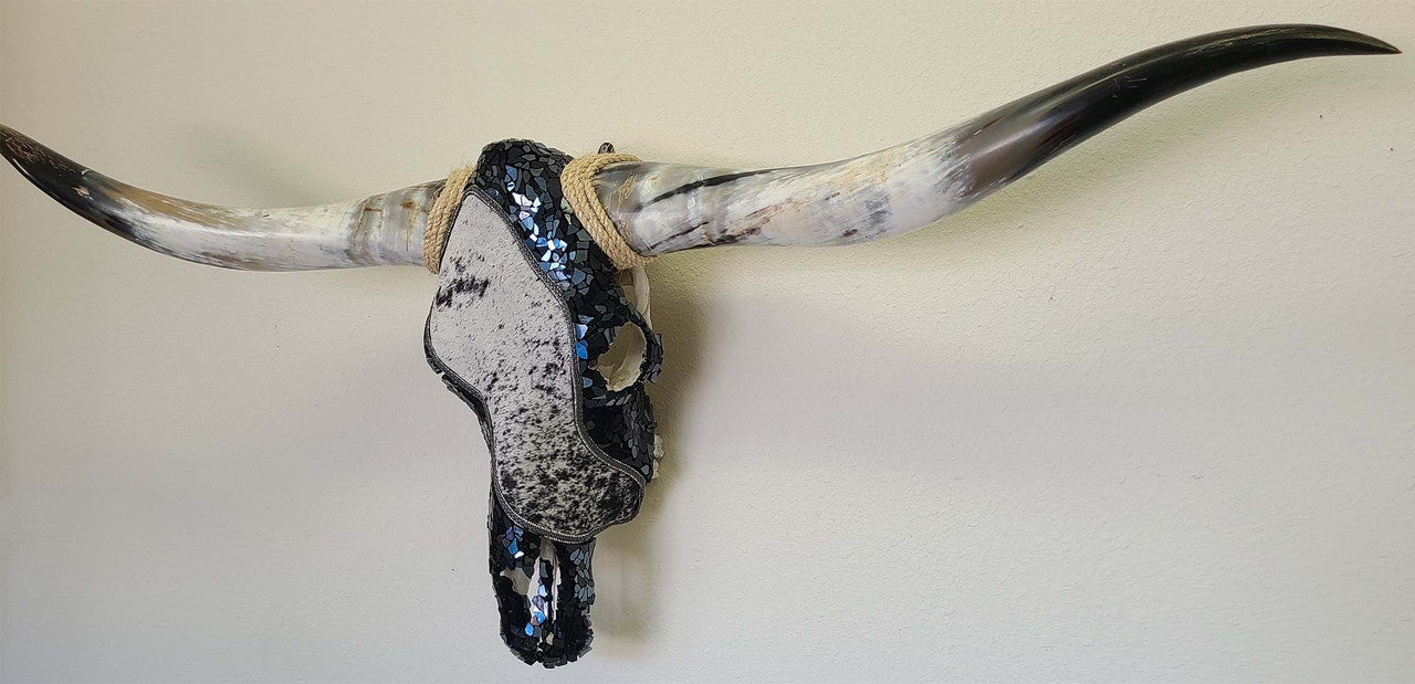 Authentic Longhorn Skull with Cowhide & Black Glass