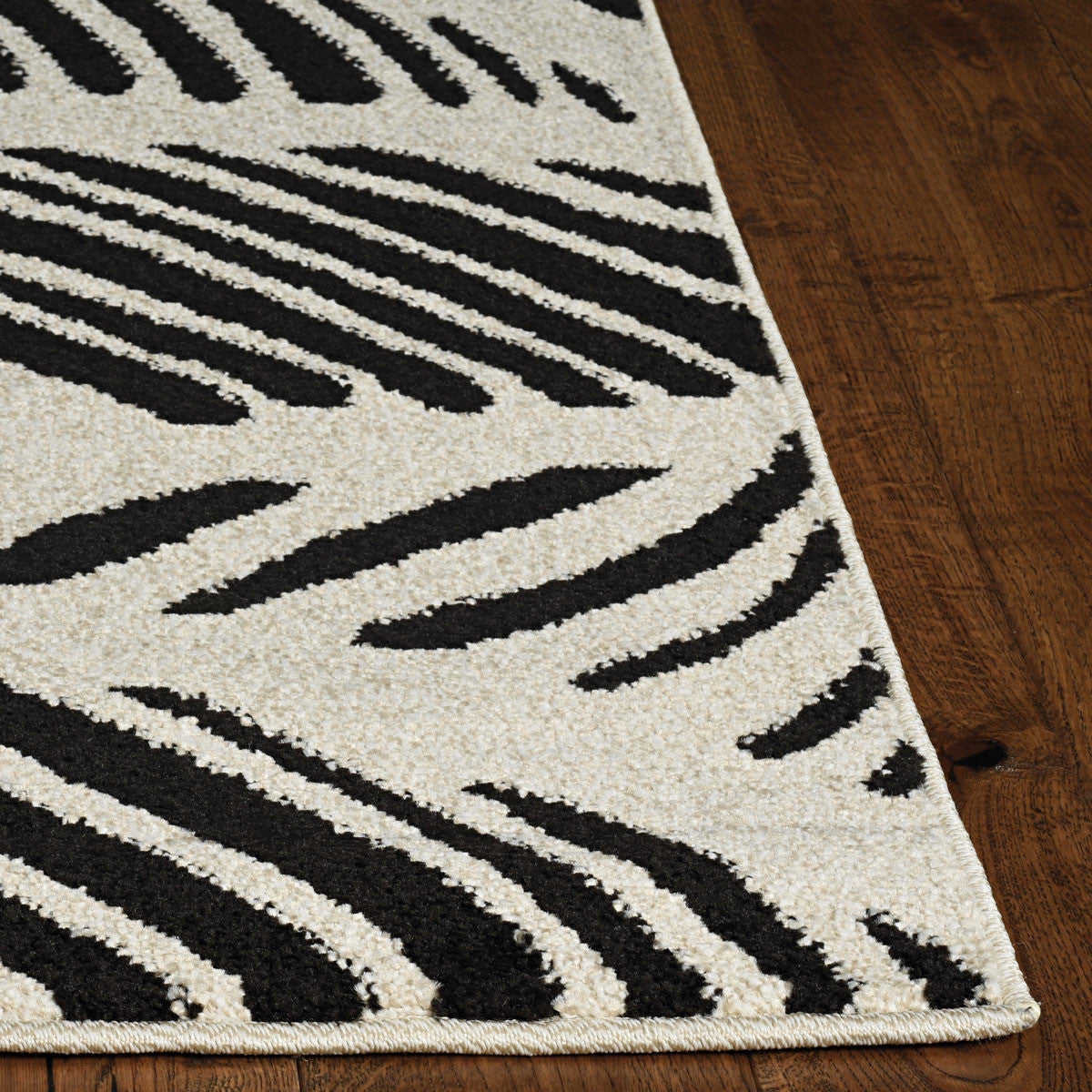 Dusk Feathers Indoor/Outdoor Rug Collection