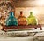 Set of Three Glass Tequila Bottles with Iron Tray