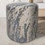 Confetti Gray Cowhide Round Pouf